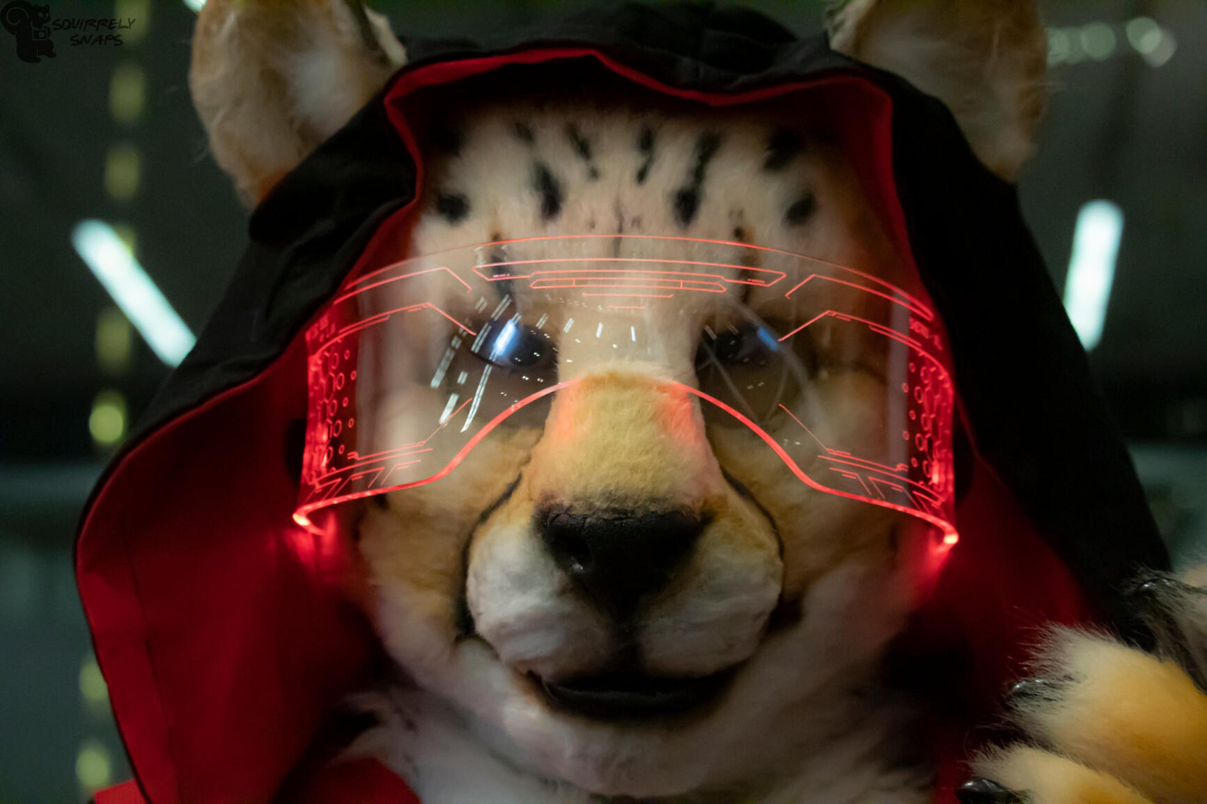 Shetani wearing a formal black floral print dress &amp; black shawl