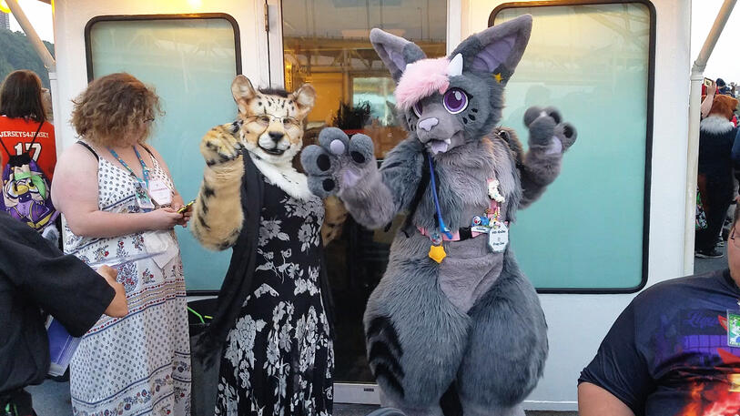 Shetani dancing with Quibbles the bat-monster hybrid