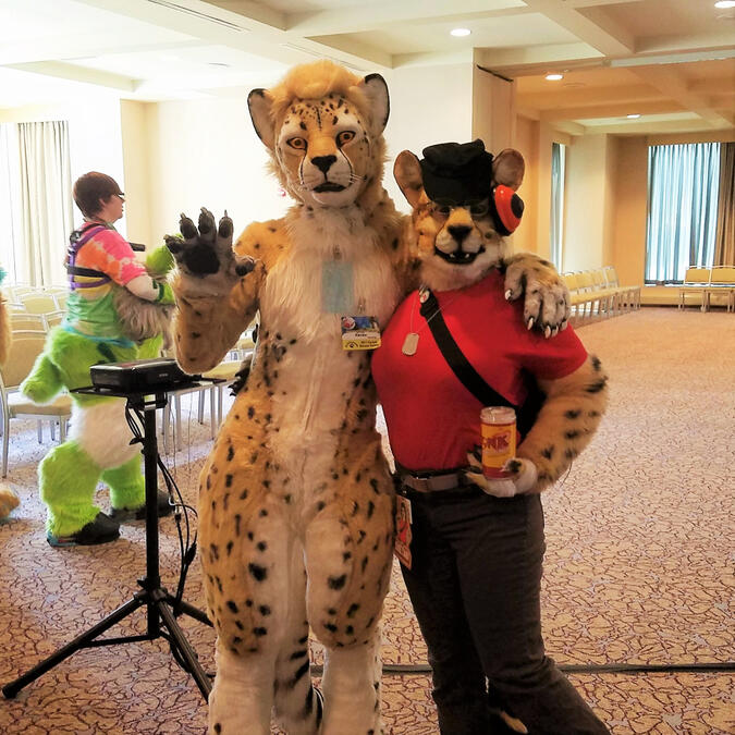 Shetani posing with Ransu the cheetah
