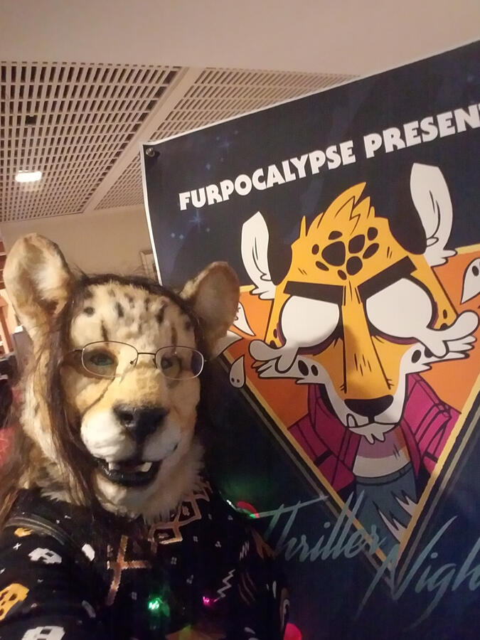 Shetani with the Furpocalypse sign