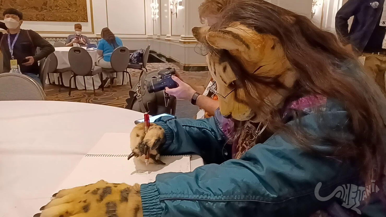 Shetanidrawing in a sketchbook