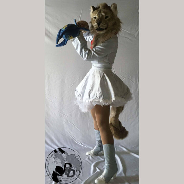 Samson the lion dressed as Weiss Schnee from RWBY